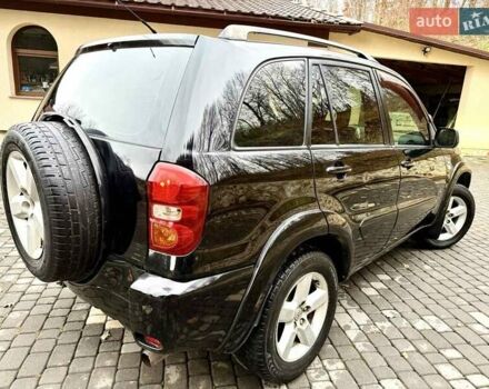 Черный Тойота РАВ 4, объемом двигателя 2 л и пробегом 199 тыс. км за 6999 $, фото 33 на Automoto.ua