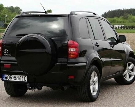 Черный Тойота РАВ 4, объемом двигателя 2 л и пробегом 210 тыс. км за 2600 $, фото 2 на Automoto.ua