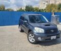 Черный Тойота РАВ 4, объемом двигателя 2 л и пробегом 330 тыс. км за 4350 $, фото 1 на Automoto.ua