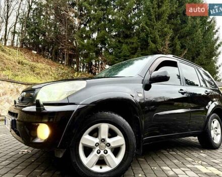 Черный Тойота РАВ 4, объемом двигателя 2 л и пробегом 199 тыс. км за 6999 $, фото 78 на Automoto.ua