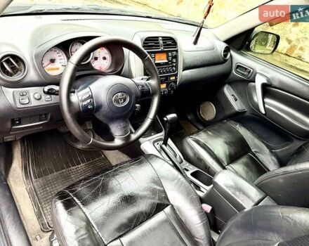 Черный Тойота РАВ 4, объемом двигателя 2 л и пробегом 199 тыс. км за 6999 $, фото 2 на Automoto.ua