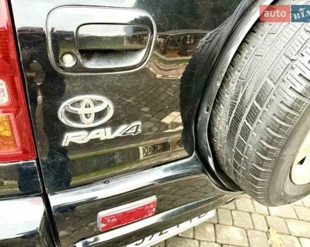 Черный Тойота РАВ 4, объемом двигателя 2 л и пробегом 199 тыс. км за 6999 $, фото 1 на Automoto.ua