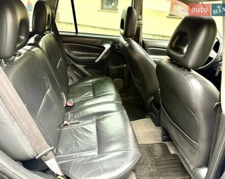 Черный Тойота РАВ 4, объемом двигателя 2 л и пробегом 199 тыс. км за 6999 $, фото 43 на Automoto.ua