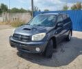 Черный Тойота РАВ 4, объемом двигателя 2 л и пробегом 320 тыс. км за 4550 $, фото 1 на Automoto.ua