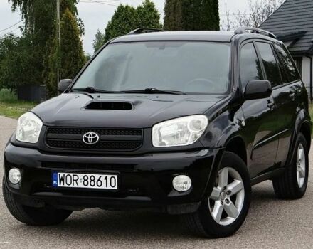 Черный Тойота РАВ 4, объемом двигателя 2 л и пробегом 210 тыс. км за 2600 $, фото 1 на Automoto.ua