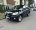Черный Тойота РАВ 4, объемом двигателя 2 л и пробегом 300 тыс. км за 4000 $, фото 1 на Automoto.ua