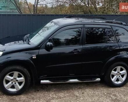 Черный Тойота РАВ 4, объемом двигателя 2 л и пробегом 186 тыс. км за 9500 $, фото 1 на Automoto.ua