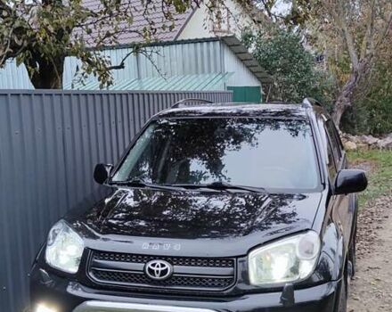 Черный Тойота РАВ 4, объемом двигателя 2 л и пробегом 186 тыс. км за 9500 $, фото 3 на Automoto.ua