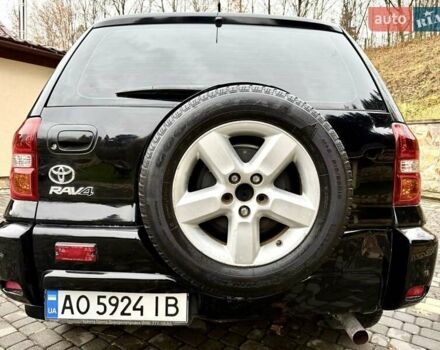 Черный Тойота РАВ 4, объемом двигателя 2 л и пробегом 199 тыс. км за 6999 $, фото 4 на Automoto.ua
