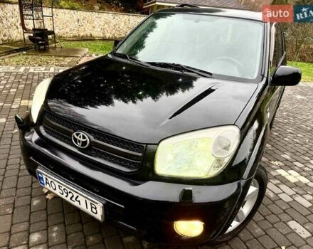 Черный Тойота РАВ 4, объемом двигателя 2 л и пробегом 199 тыс. км за 6999 $, фото 80 на Automoto.ua