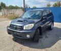 Черный Тойота РАВ 4, объемом двигателя 2 л и пробегом 330 тыс. км за 4350 $, фото 1 на Automoto.ua
