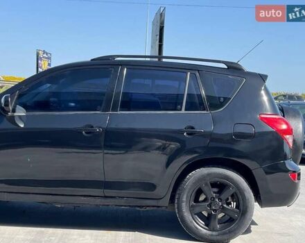 Чорний Тойота РАВ 4, об'ємом двигуна 2 л та пробігом 300 тис. км за 8290 $, фото 4 на Automoto.ua