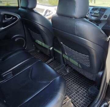 Черный Тойота РАВ 4, объемом двигателя 2 л и пробегом 165 тыс. км за 9500 $, фото 12 на Automoto.ua
