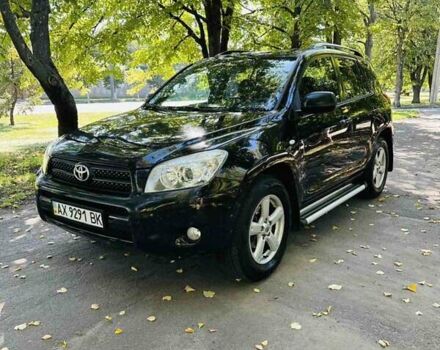 Чорний Тойота РАВ 4, об'ємом двигуна 2 л та пробігом 257 тис. км за 7999 $, фото 1 на Automoto.ua