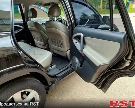 Чорний Тойота РАВ 4, об'ємом двигуна 2.4 л та пробігом 191 тис. км за 9900 $, фото 6 на Automoto.ua