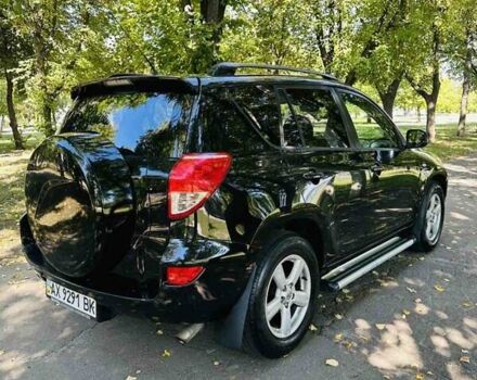 Чорний Тойота РАВ 4, об'ємом двигуна 2 л та пробігом 257 тис. км за 7999 $, фото 3 на Automoto.ua