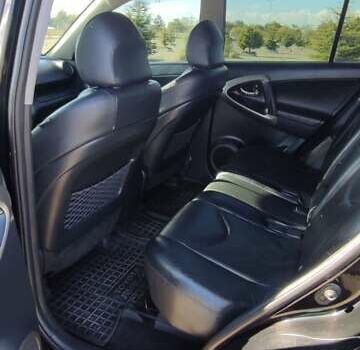 Черный Тойота РАВ 4, объемом двигателя 2 л и пробегом 165 тыс. км за 9500 $, фото 3 на Automoto.ua