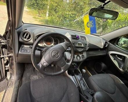 Черный Тойота РАВ 4, объемом двигателя 2 л и пробегом 291 тыс. км за 9300 $, фото 4 на Automoto.ua