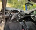 Черный Тойота РАВ 4, объемом двигателя 2 л и пробегом 291 тыс. км за 9300 $, фото 4 на Automoto.ua