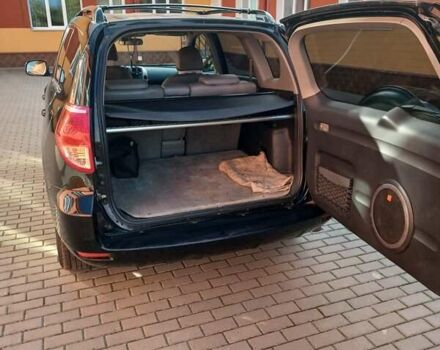 Черный Тойота РАВ 4, объемом двигателя 2.36 л и пробегом 200 тыс. км за 9000 $, фото 4 на Automoto.ua