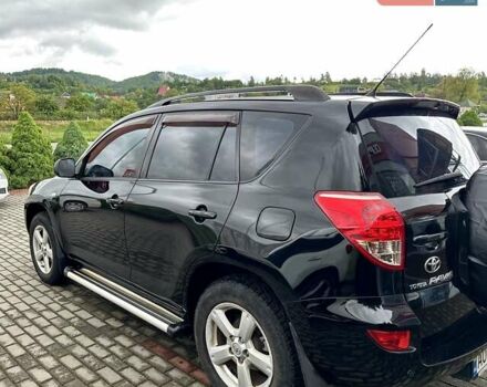 Черный Тойота РАВ 4, объемом двигателя 2 л и пробегом 245 тыс. км за 7999 $, фото 4 на Automoto.ua