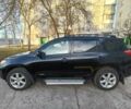Черный Тойота РАВ 4, объемом двигателя 2.4 л и пробегом 270 тыс. км за 9700 $, фото 1 на Automoto.ua