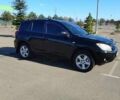 Черный Тойота РАВ 4, объемом двигателя 2 л и пробегом 165 тыс. км за 9500 $, фото 1 на Automoto.ua