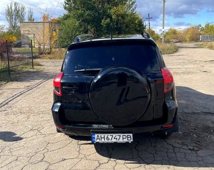 Черный Тойота РАВ 4, объемом двигателя 2.4 л и пробегом 240 тыс. км за 9600 $, фото 4 на Automoto.ua