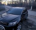 Черный Тойота РАВ 4, объемом двигателя 2 л и пробегом 241 тыс. км за 9000 $, фото 1 на Automoto.ua
