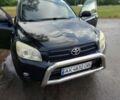 Черный Тойота РАВ 4, объемом двигателя 2.4 л и пробегом 219 тыс. км за 10500 $, фото 2 на Automoto.ua