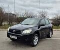 Чорний Тойота РАВ 4, об'ємом двигуна 2 л та пробігом 173 тис. км за 8600 $, фото 3 на Automoto.ua