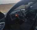 Чорний Тойота РАВ 4, об'ємом двигуна 2 л та пробігом 242 тис. км за 9000 $, фото 4 на Automoto.ua
