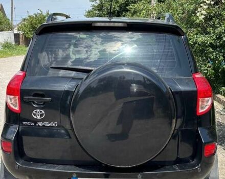 Черный Тойота РАВ 4, объемом двигателя 2 л и пробегом 291 тыс. км за 8400 $, фото 1 на Automoto.ua