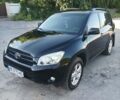 Чорний Тойота РАВ 4, об'ємом двигуна 2 л та пробігом 240 тис. км за 10300 $, фото 1 на Automoto.ua