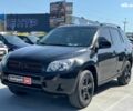 Чорний Тойота РАВ 4, об'ємом двигуна 2 л та пробігом 300 тис. км за 8290 $, фото 1 на Automoto.ua
