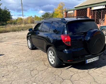 Черный Тойота РАВ 4, объемом двигателя 2.4 л и пробегом 240 тыс. км за 9600 $, фото 3 на Automoto.ua