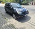 Черный Тойота РАВ 4, объемом двигателя 2.4 л и пробегом 214 тыс. км за 9000 $, фото 2 на Automoto.ua