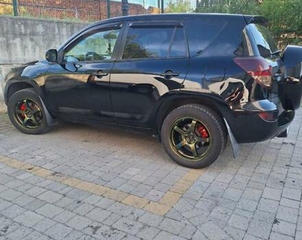 Черный Тойота РАВ 4, объемом двигателя 2 л и пробегом 264 тыс. км за 9200 $, фото 4 на Automoto.ua