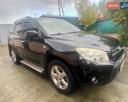 Чорний Тойота РАВ 4, об'ємом двигуна 2 л та пробігом 184 тис. км за 12000 $, фото 4 на Automoto.ua