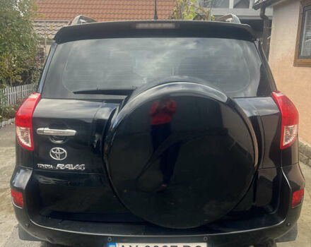 Чорний Тойота РАВ 4, об'ємом двигуна 2 л та пробігом 184 тис. км за 12000 $, фото 2 на Automoto.ua