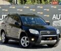 Чорний Тойота РАВ 4, об'ємом двигуна 2 л та пробігом 170 тис. км за 9900 $, фото 1 на Automoto.ua