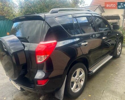 Чорний Тойота РАВ 4, об'ємом двигуна 2 л та пробігом 184 тис. км за 12000 $, фото 3 на Automoto.ua
