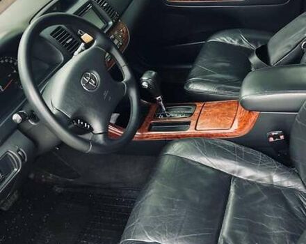 Чорний Тойота РАВ 4, об'ємом двигуна 2 л та пробігом 220 тис. км за 9300 $, фото 4 на Automoto.ua