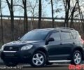 Черный Тойота РАВ 4, объемом двигателя 20 л и пробегом 150 тыс. км за 11750 $, фото 1 на Automoto.ua