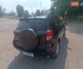 Черный Тойота РАВ 4, объемом двигателя 2 л и пробегом 181 тыс. км за 10500 $, фото 4 на Automoto.ua