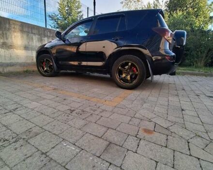 Черный Тойота РАВ 4, объемом двигателя 2 л и пробегом 264 тыс. км за 9200 $, фото 3 на Automoto.ua