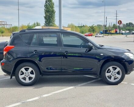 Черный Тойота РАВ 4, объемом двигателя 2 л и пробегом 237 тыс. км за 8799 $, фото 1 на Automoto.ua