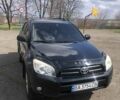 Черный Тойота РАВ 4, объемом двигателя 2.4 л и пробегом 187 тыс. км за 9700 $, фото 1 на Automoto.ua