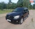 Черный Тойота РАВ 4, объемом двигателя 2 л и пробегом 181 тыс. км за 10500 $, фото 1 на Automoto.ua