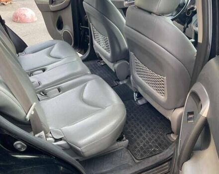 Черный Тойота РАВ 4, объемом двигателя 2.4 л и пробегом 290 тыс. км за 9800 $, фото 1 на Automoto.ua